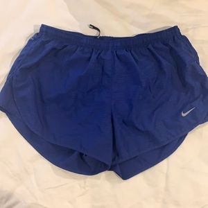 Blue Nike dri-fit running shorts